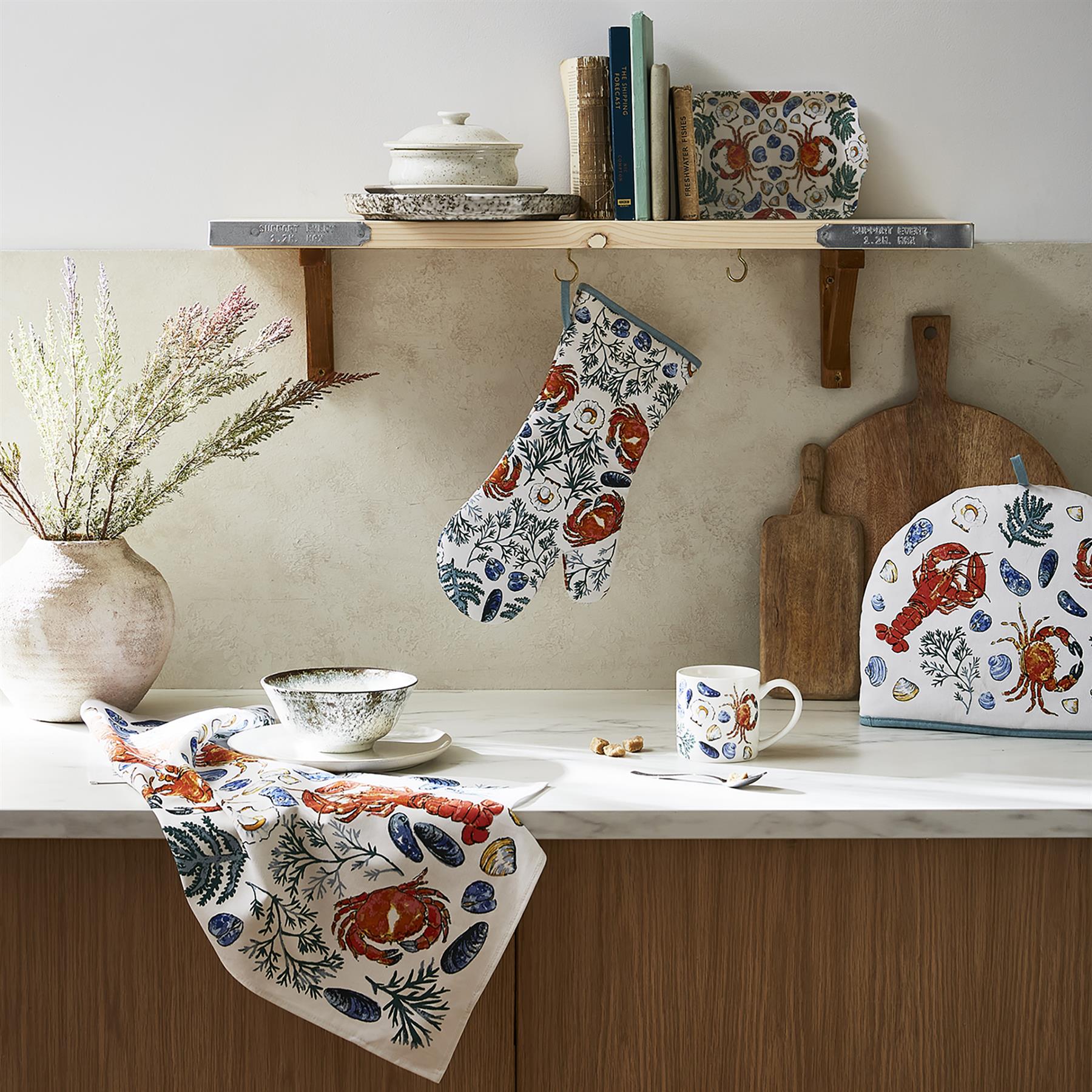 Gant de cuisine vert à motif coquillages