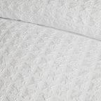 Parure de lit à carreaux en relief blanche